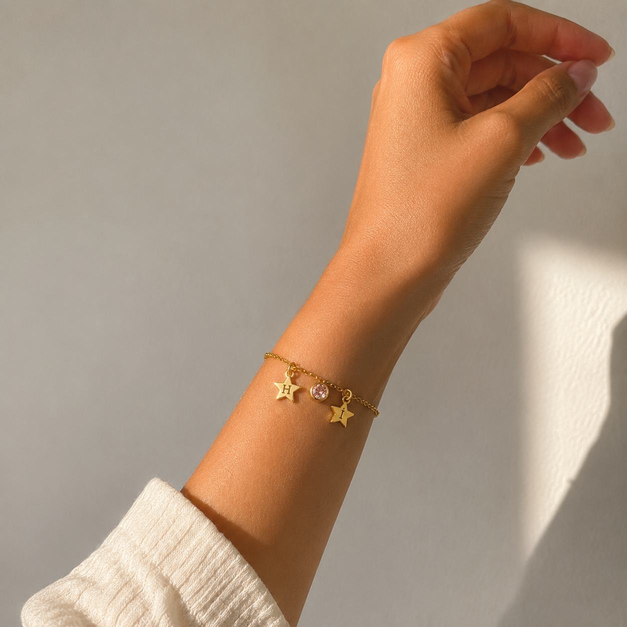armband met maandsteen ster bedels 