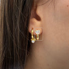 Gouden oorbel met hartvormige steen, 925 sterling zilver